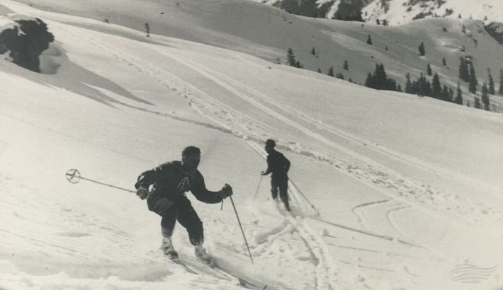 Two skiers on the slope
